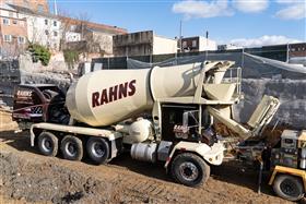 Rahns Concrete: A Rahns Concrete McNeilus ready-mix concrete mixer delivery concrete to a site. 